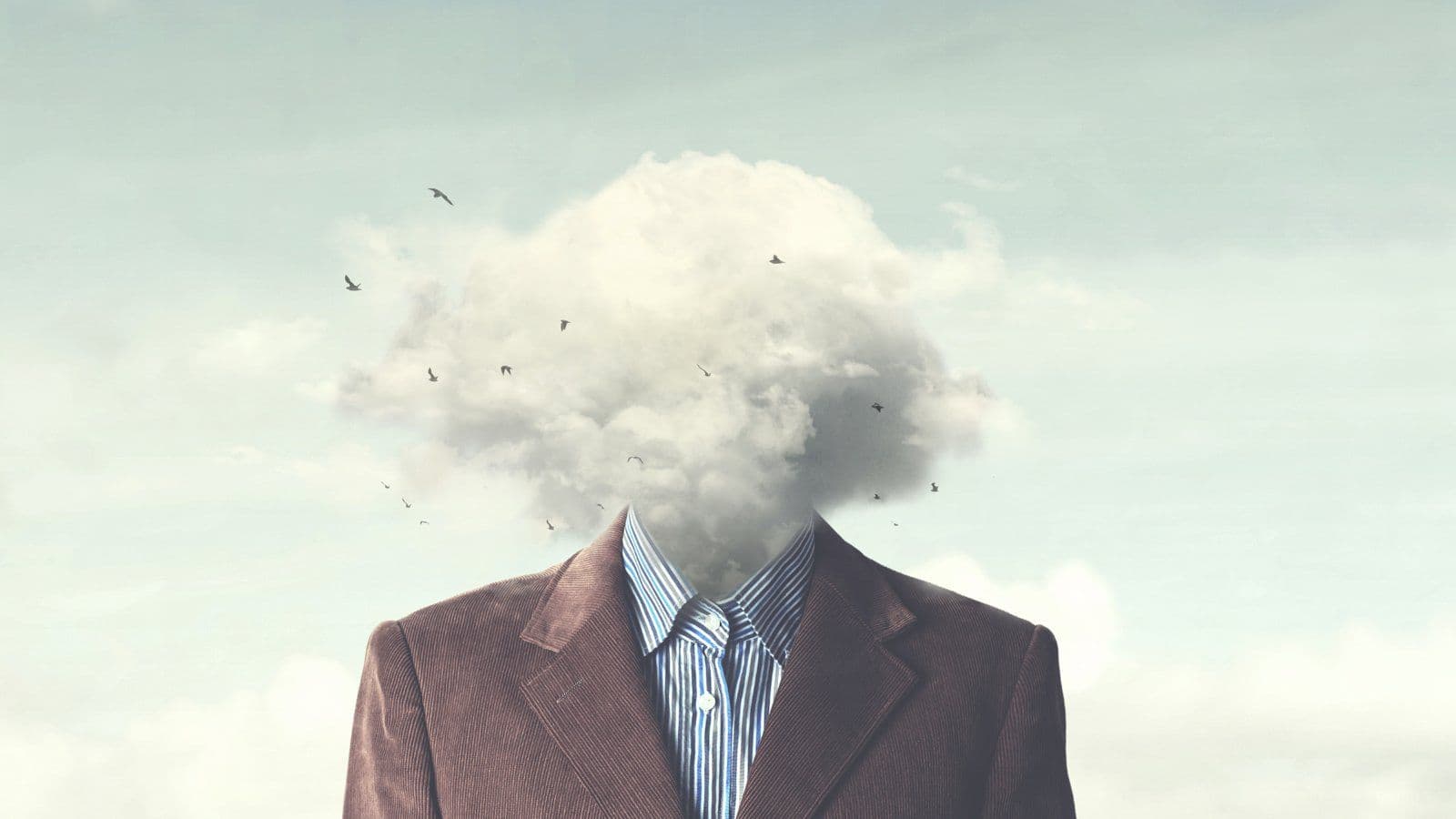 Homme en costume dont la tete est remplacee par un nuage sombre
