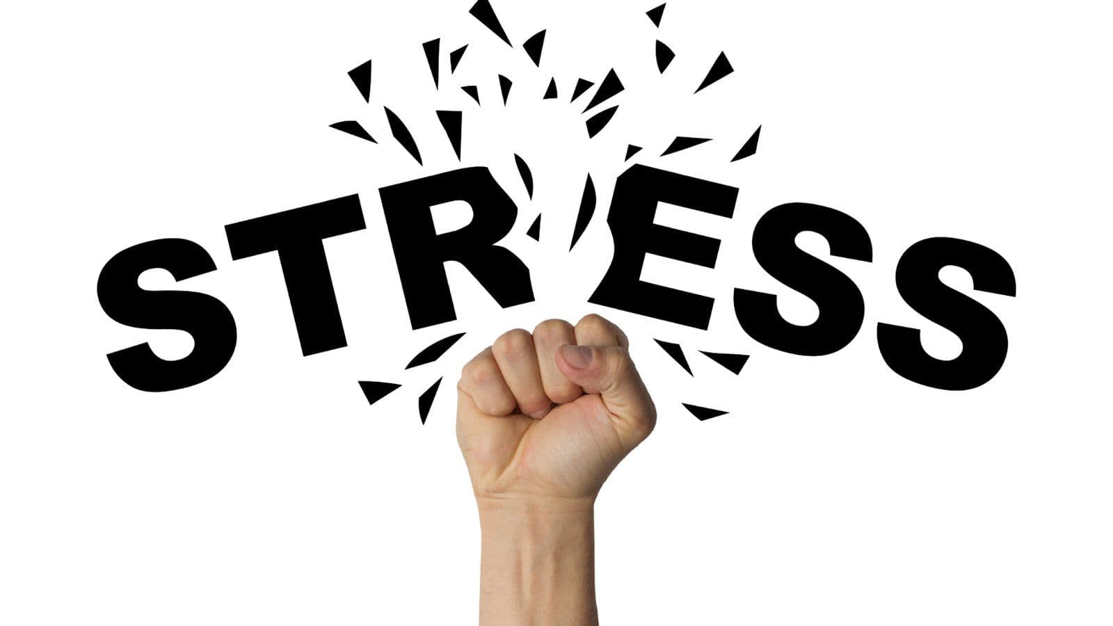 Poing brisant le mot stress ecrit en grandes lettres noires