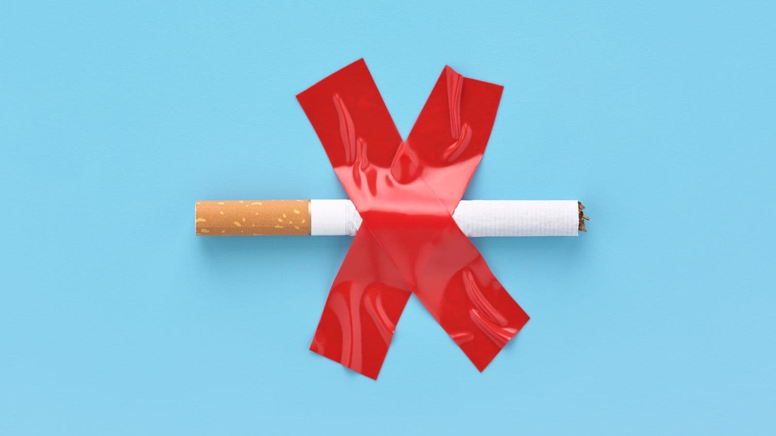 Cigarette barree d une croix rouge adhesive sur fond bleu